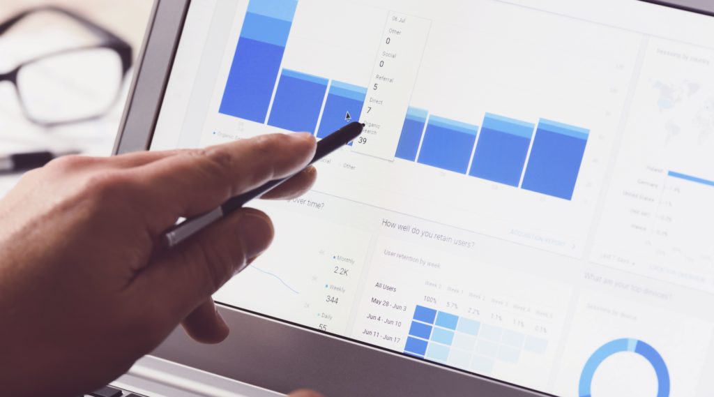 hand pointing at google search traffic results